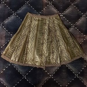 Nan-made faux snake and wool wrap skirt.